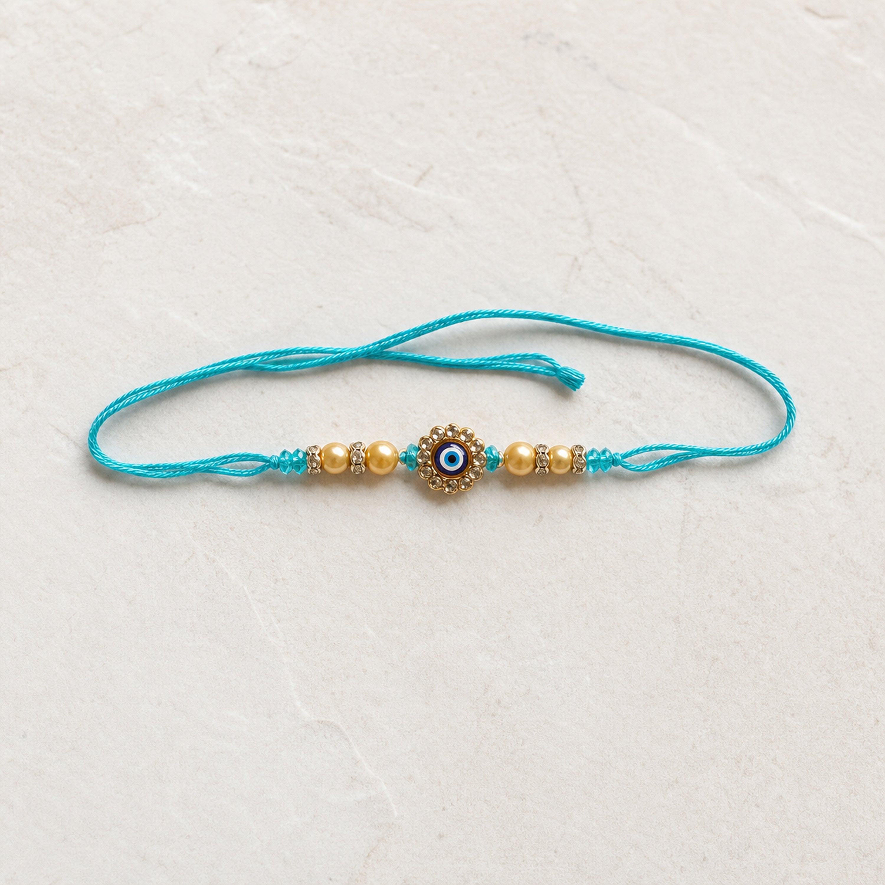 Turquoise Evil Eye Rakhi for Brother – Handcrafted Nazar Protection Bracelet for Raksha Bandhan | Labh Ethnica