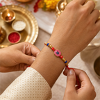 Pink Swastik Rakhi for Brother – Handcrafted Auspicious Beaded Bracelet for Raksha Bandhan | Labh Ethnica