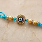 Turquoise Evil Eye Rakhi for Brother – Handcrafted Nazar Protection Bracelet for Raksha Bandhan | Labh Ethnica