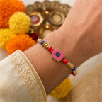 Pink Swastik Rakhi for Brother – Handcrafted Auspicious Beaded Bracelet for Raksha Bandhan | Labh Ethnica