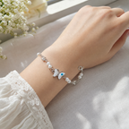 Silver Evil Eye Rakhi Bracelet with Pearls & Butterfly Charm