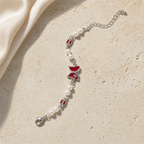 Silver Evil Eye Rakhi Bracelet with Pearls & Butterfly Charm – Nazar Protection Bracelet | Labh Ethnica