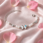 Silver Evil Eye Rakhi Bracelet with Pearls & Butterfly Charm