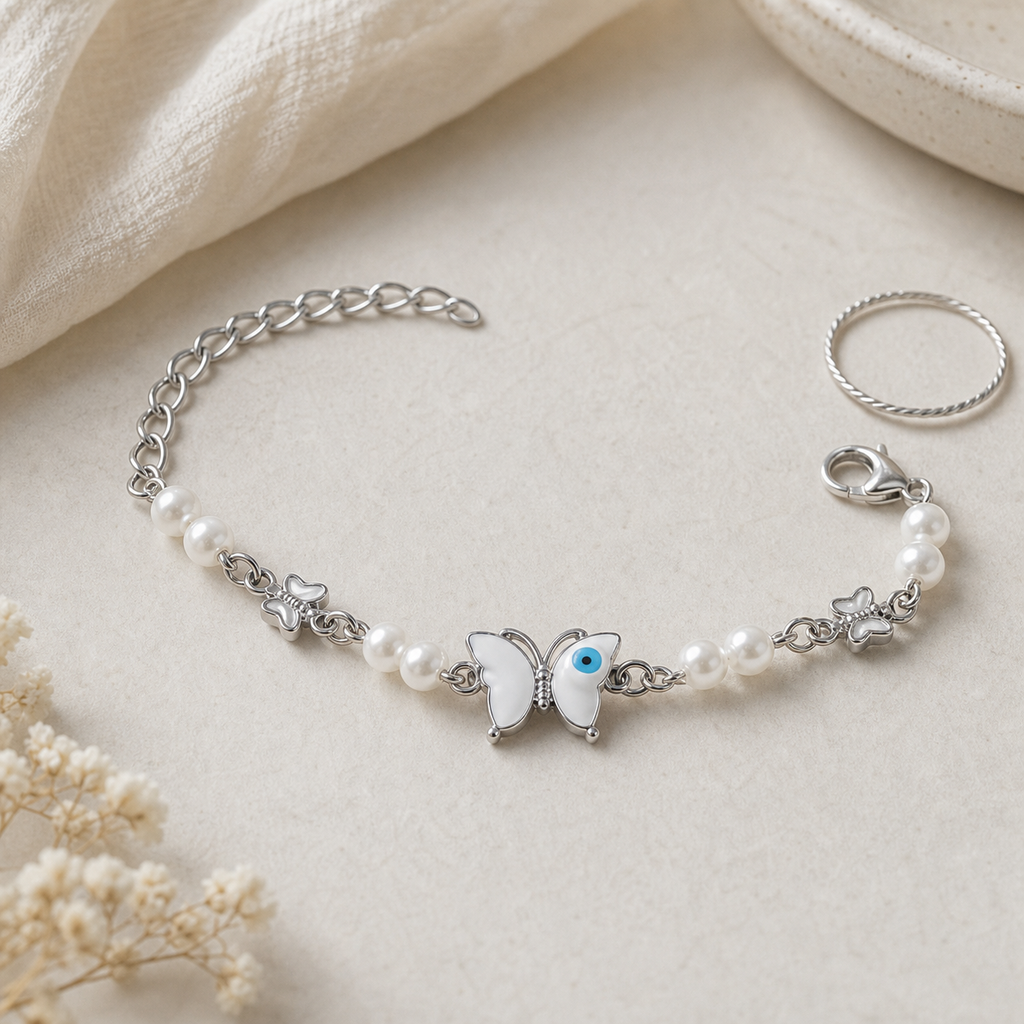 Silver Evil Eye Rakhi Bracelet with Pearls & Butterfly Charm
