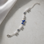 Silver Evil Eye Rakhi Bracelet with Pearls & Butterfly Charm – Nazar Protection Bracelet | Labh Ethnica