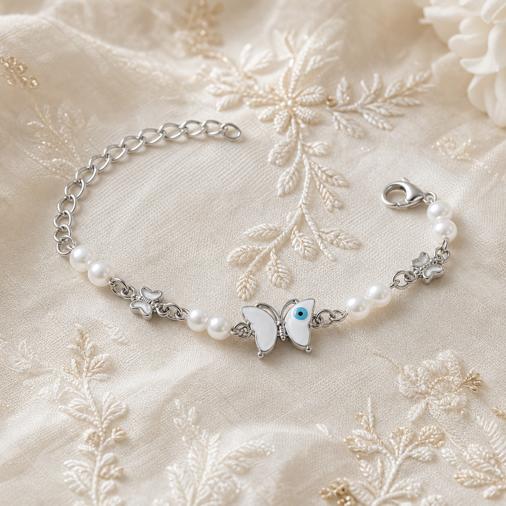 Silver Evil Eye Rakhi Bracelet with Pearls & Butterfly Charm