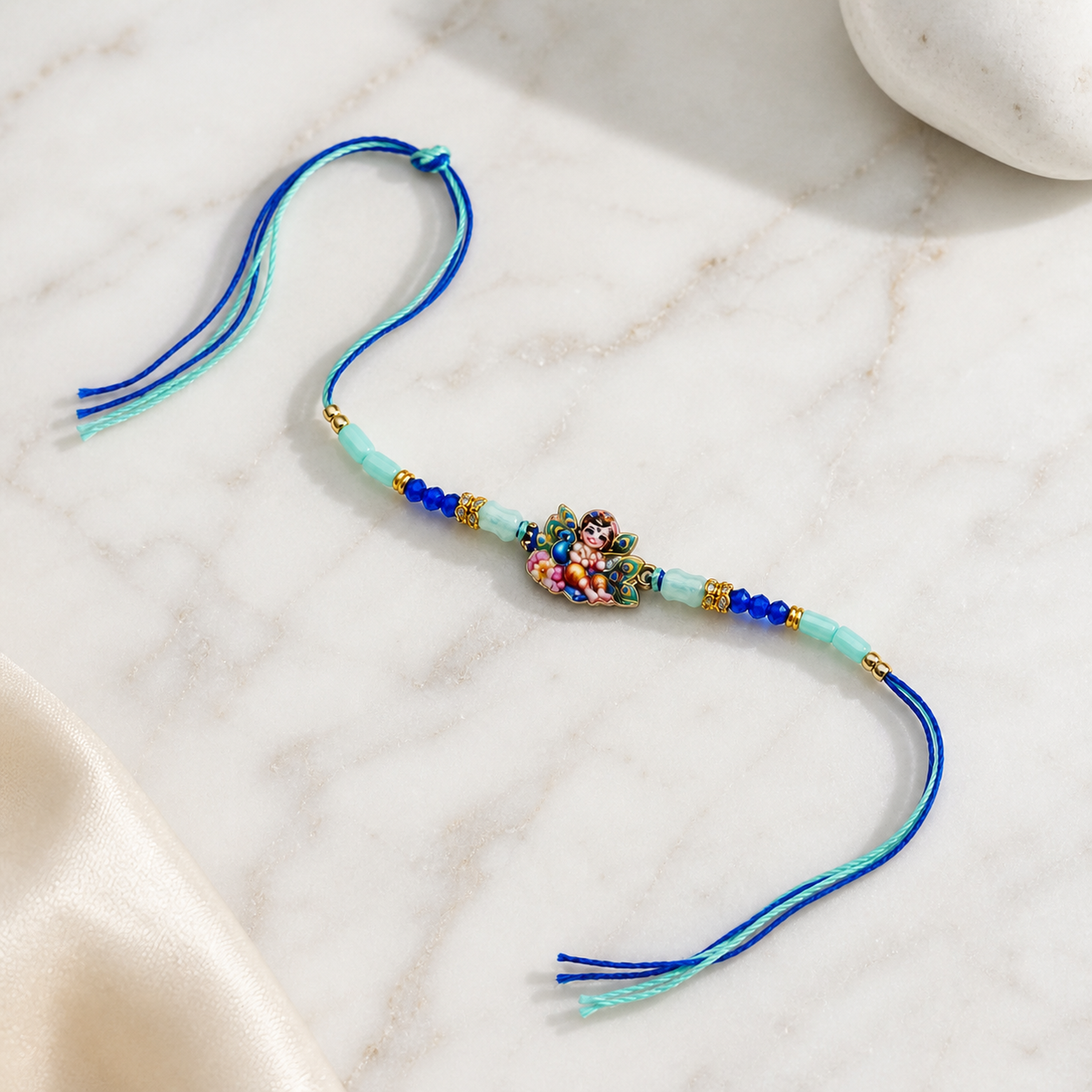 Bal Gopal Krishna Rakhi – Handcrafted Enamel Deity Beaded Tassel Bracelet for Raksha Bandhan | Labh Ethnica