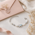 Silver Evil Eye Rakhi Bracelet with Pearls & Butterfly Charm
