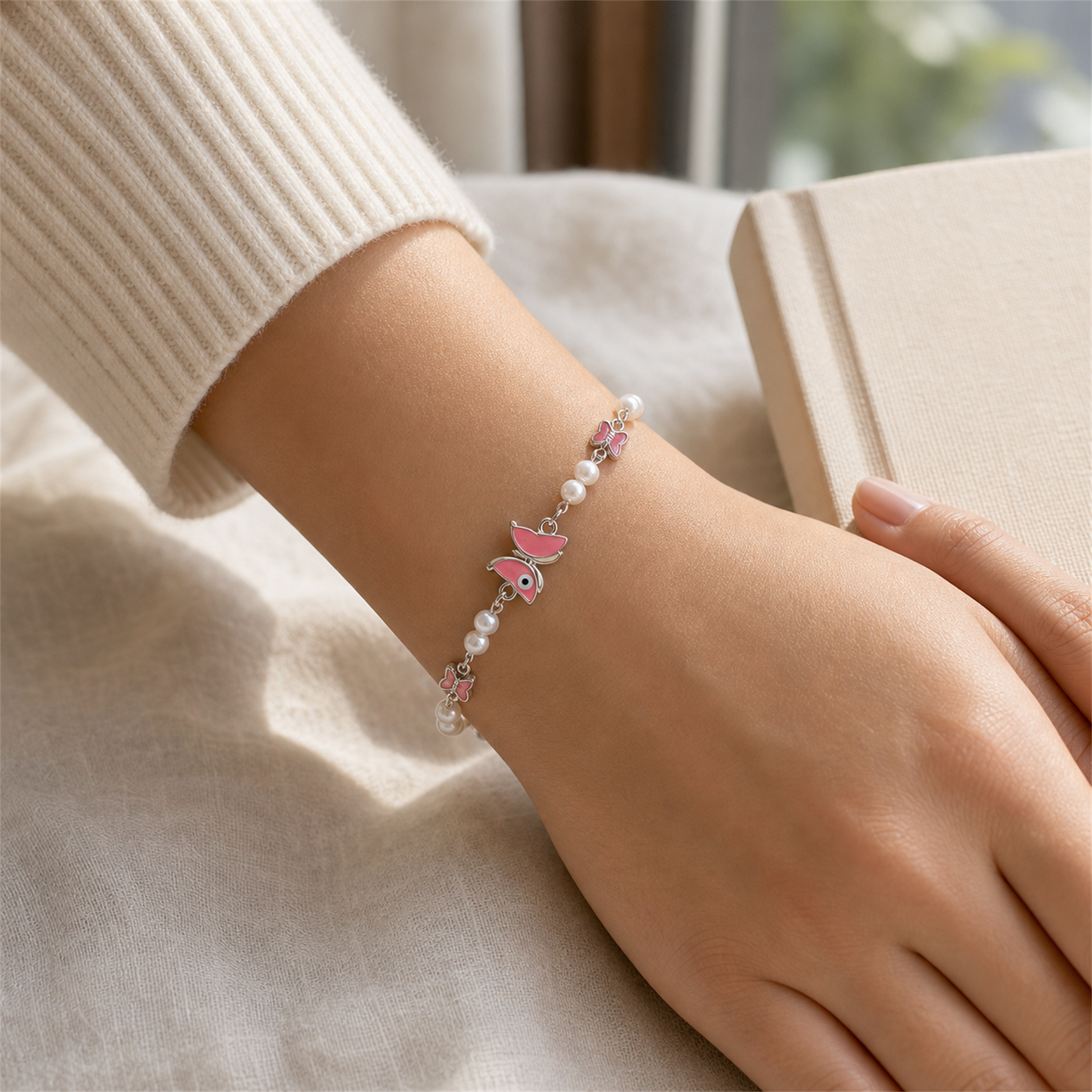 Silver Evil Eye Rakhi Bracelet with Pearls & Butterfly Charm – Nazar Protection Bracelet | Labh Ethnica