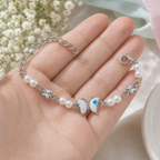 Silver Evil Eye Rakhi Bracelet with Pearls & Butterfly Charm