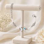 Silver Evil Eye Rakhi Bracelet with Pearls & Butterfly Charm