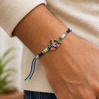 Bal Gopal Krishna Rakhi – Handcrafted Enamel Deity Beaded Tassel Bracelet for Raksha Bandhan | Labh Ethnica