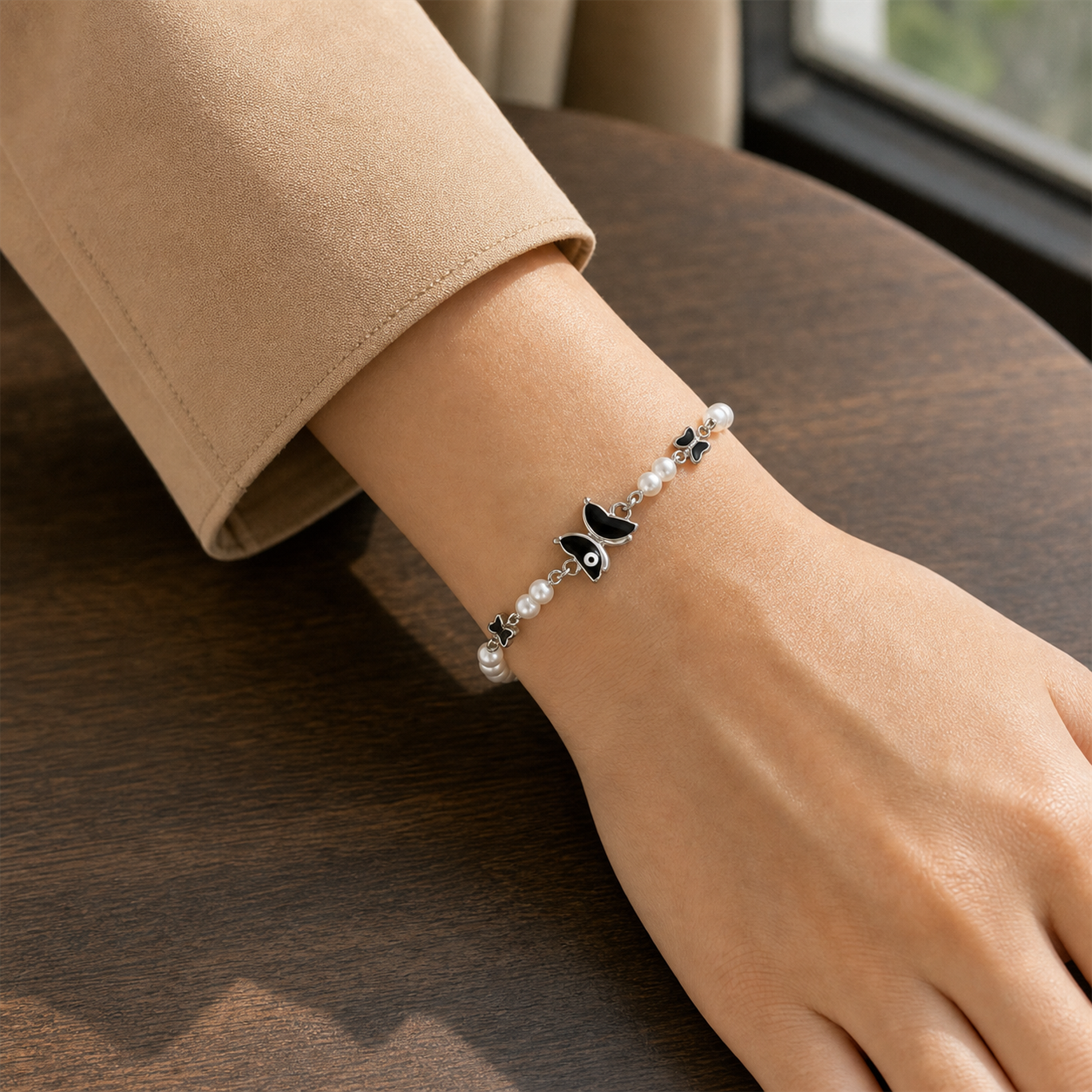 Silver Evil Eye Rakhi Bracelet with Pearls & Butterfly Charm – Nazar Protection Bracelet | Labh Ethnica