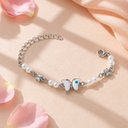 Silver Evil Eye Rakhi Bracelet with Pearls & Butterfly Charm