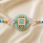 Aqua Bhaiya Bhabhi Rakhi Set – Pearl & Crystal Star Duo