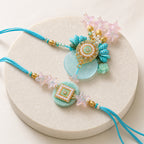 Aqua Bhaiya Bhabhi Rakhi Set – Pearl & Crystal Star Duo