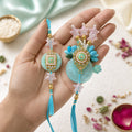 Aqua Bhaiya Bhabhi Rakhi Set – Pearl & Crystal Star Duo